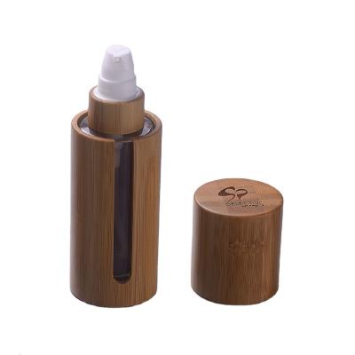 China bamboo cosmetic foundation bottle bamboo container inner glass with bamboo cover for sale