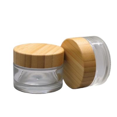 China 30ml 50ml glass jar with bamboo lid bamboo packaging eco cosmetic packaging wooden jar for sale