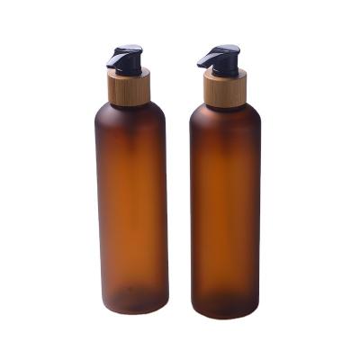 China 100m l150ml 250ml 300ml amber pet bottle pet plastic bottle with bamboo spray pump bottle for sale