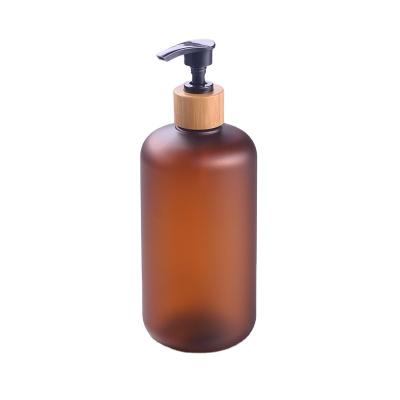 China New Fashion Pet Bottle Pump Customer Dispenser Pet Plastic with Bamboo 500ml Shampoo Home Cosmetic Plastic Container Amber OEM for sale