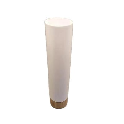 China 100ml 250ml white PE plastic cosmetic tube for cream with bamboo screw lid eco friendly natural cosmetic packaging for sale