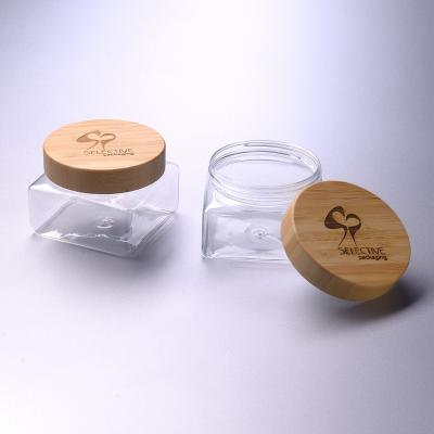 China 350g square transparent cream PET jar with bamboo cap for sale