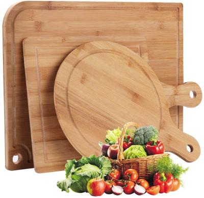 China Sustainable Round Bamboo Pizza Panel Organic Bamboo Cutting Board Set 3-Piece with Juice Groove for sale