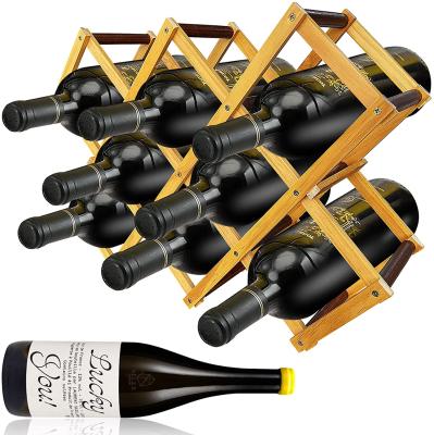 China Foldable Expanding Wine Racks Bamboo Wine Drying Rack Rack Countertop with 8 Slots for 750ML Champagne Bottle for sale