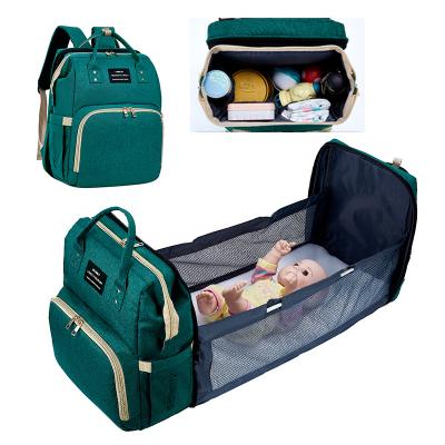 China Water Resistant Stock Fashion Baby Diaper Bags Multi Function Portable Diaper Bag With Changing Station Baby Travel Backpack With Bed for sale