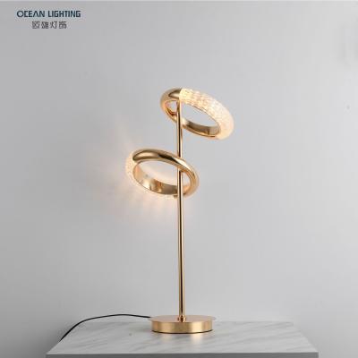 China Modern Ocean Lamp Iron Plating Modern Acrylic Lamp Bedroom Table Lights for sale