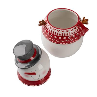 China Beautiful and Useful Custom Art Ceramic Knitted Snowman Shaped Oriental Cookie Jar for sale