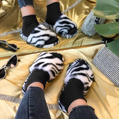 China New Trend 2021 Fashion Women Plush Slippers MS Flat Bottom Women Faux Stone Faux Fur Chic Soft Plush Furry Home Shoes Flip Flop for sale