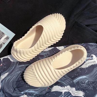 China Waterproof Hot Selling Summer Non-slip Men Garden Shoes Sandals Coconut Explosion Models Sandals and Skeleton Slippers Men for sale