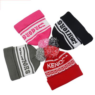 China Custom Trade Show Winter Striped Pom Pom Beanie MOQ100 Acrylic Flat Knitting 4 Color Jacquard Pom Pom Beanie Hats for sale