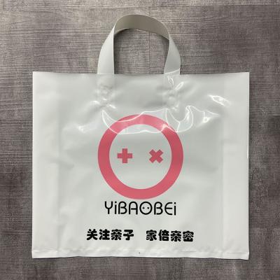 China Custom Clothing Store Plastic Bag Logo Apparel Handbag Moisture Proof Custom Printing Thick Gift Packaging Shopping Bag for sale