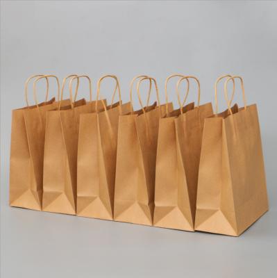 China Wholesale Recyclable Cheap Brown Kraft Paper Food Bag With Twisted Handle for sale