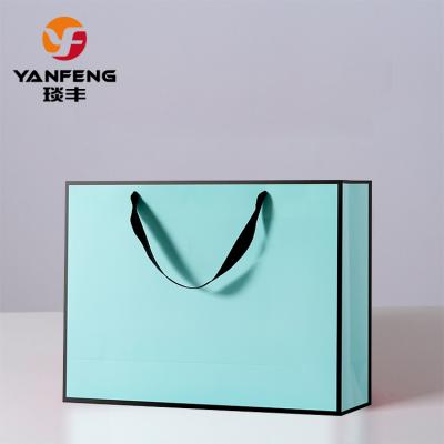 China Recyclable Luxury Matt Laminated Coated Cardboard Custom Paper Bag With Logo for sale