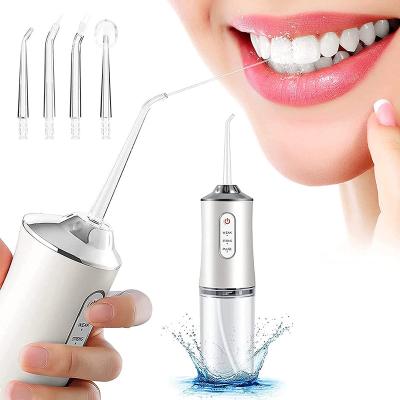 China Car 22 Mini Electric Water Flosser Oral Irrigator Home Use High Water Pressure With 220ml Water Tank for sale