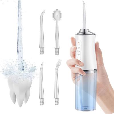 China Hot Selling Multifunctional Car Amazon Water Flosser Oral Irrigator Dental Care Radio with 4 Nozzles for sale