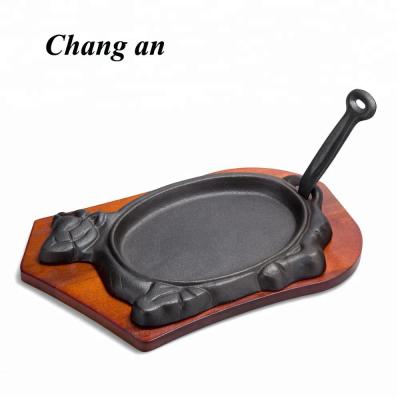 China Cast Iron Cow Shape Steak Sustainable Preseasoned Meat Sizzling Pan for sale