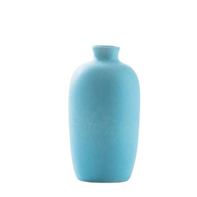 China Minimalist Economic Custom Design Modern Feature Luxury Ceramic Vase Ornament for sale