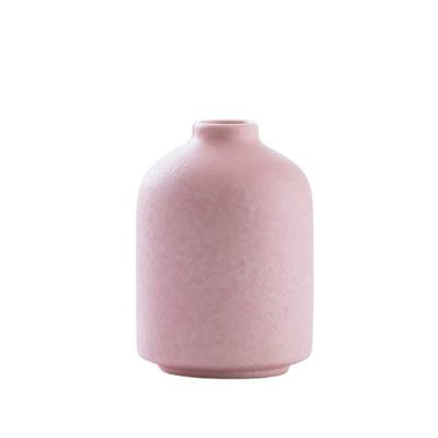 China Top quality minimalist widely used modern irregular ceramic flower vase for home decor for sale