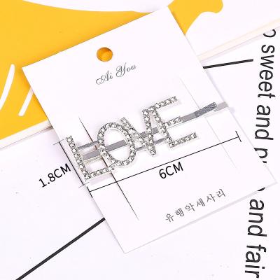 China And fashionable decoration simple exquisite net red English letters silver rhinestone word clip hits clip hair accessories for sale