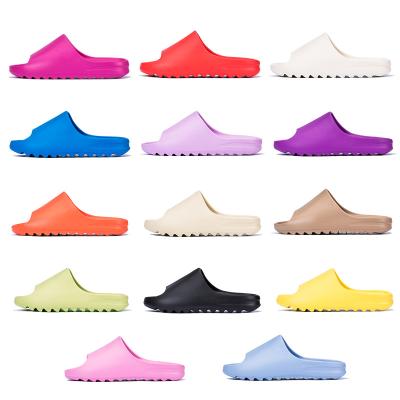 China Fashion Trend Yeezy Slide 14 Colors EVA Sandal Footwear Candy Purple Orange Blue Red Pink Color Yeezy Slipper For Ladies High Quality For Men for sale