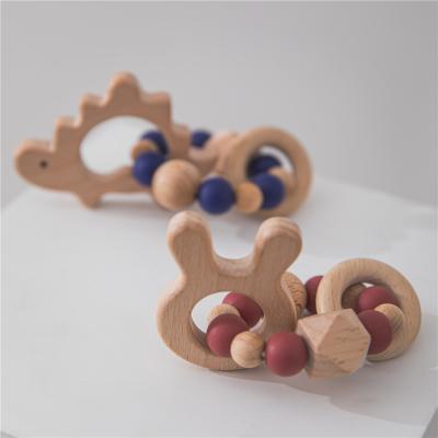 China 2021 WOODEN Top Selling Cute Colorful Wood Teethers Ring Baby Teething Toy Silicone Baby Teethers Bead Toys for sale