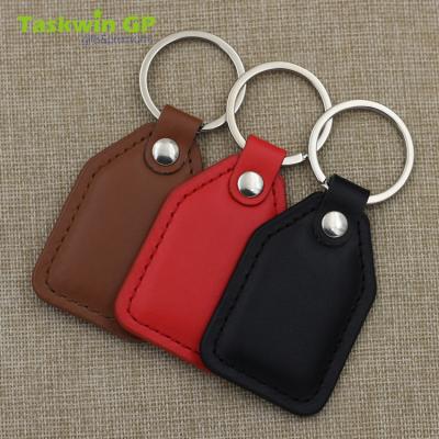 China Custom Genuine Leather Keychain Key Chain Holder Logo Embossed Leather Keyring Engraved for sale