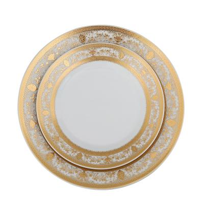 China Contemporary Hot Selling Luxury Gold Rim Ceramic Dinner Plate Charger Dish For Home Party Wedding for sale