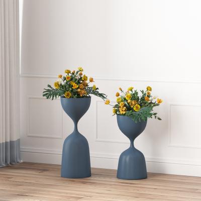 China Modern Creative Oval Shape Plant Pot Flower Stand Flower Stand Low Price Golden Flower Pot for sale