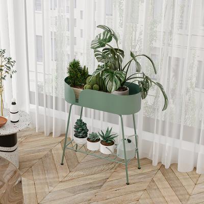 China Modern Nordic luxury living room flower stand balcony wrought iron flower stand fleshy floor-standing radish green plant pot r for sale