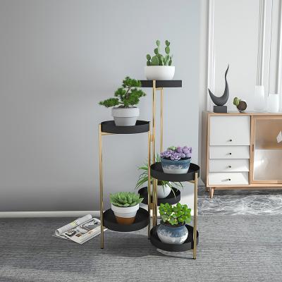 China Modern indoor simple green radish floor style luxury multi-layer shelf living room flower pot flower rack Nordic Insti flower rack for sale