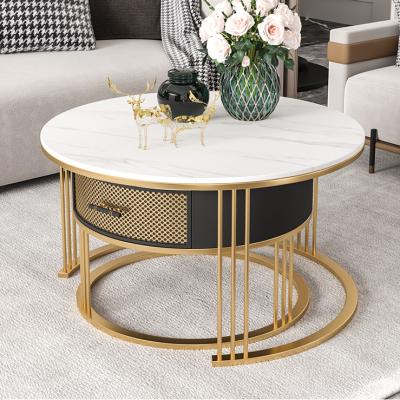 China Small apartment household creative modern Nordic simple light luxury modern living room combination tea table round rock tea table for sale