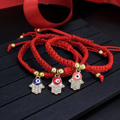 China 2022 Ethnic Lucky Turkey Blue Eye Hamsa Fatimas Fatimas String Rope Blessed Adjustable Handmade Braided Red Bracelet for sale