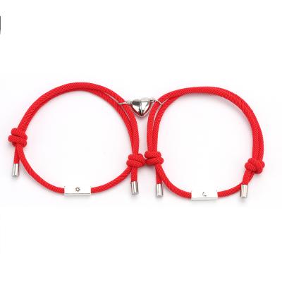 China 2pcs/set Romantic Knitted Custom Magnetic Sun and Moon Braided Red Rope Heart Magnet Couples Bracelets for sale