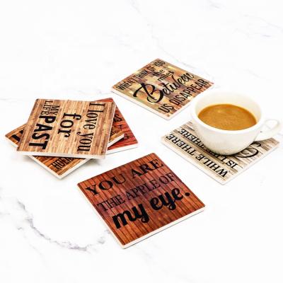 China Cute Ceramic Mat Desk Tea Coffee Wooden Square Cup Table Letter Coasters Mats and Pads Set Home Decoration for sale