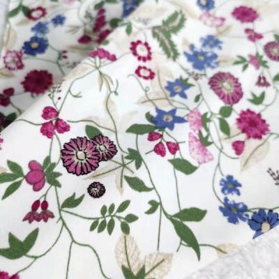 China Stretch printed spring laster new design floral print ity high quality spandex knit fabric for sale