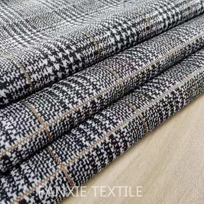 China Cheap fan xie breathable textile knit stretch polyester plaid dye nylon spandex jacquard fabric yare for sale