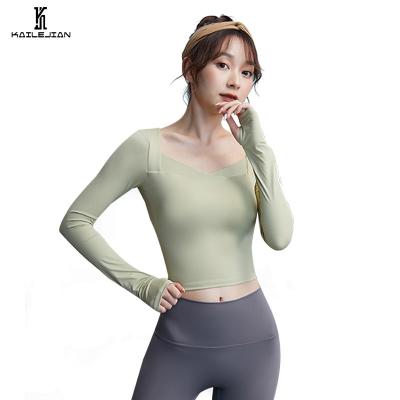 China Breathable Women Workout Yoga Push Up Leggings Long Sleeve Fitness Clothing Seamless Fitness Yoga Tops Gym Fitness Sets for sale