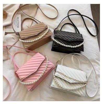 China Wholesale Fashion Bags Pure Pearl Striped Chains Color Cover Fashion Bags For Ladies Girls PU Leather Shoulder Cross - Body Bag for sale