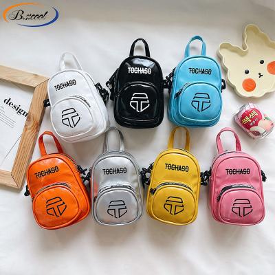 China Fashion Mini Pu Leather Double Straps Kids Backpack Pure Color Handbags Shape Letter Print Women Bags Shoulder Bag RY73219 for sale