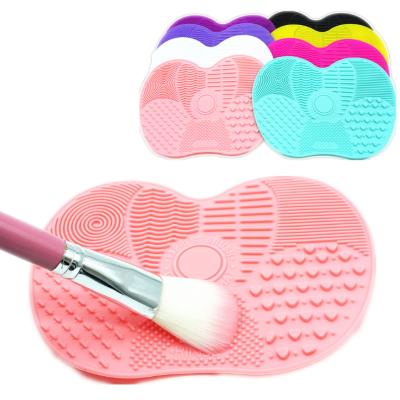 China Eco-friendly Portable Cosmetic Pad Silicone Makeup Brush Cleaner Mat Makeup Brush Cleaner With Suction Cups for sale