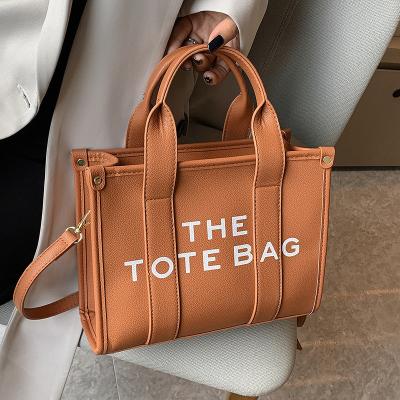 China Brand New Arrival 2023 Fashion Designer Handbags Pu Leather Tote Bag Famous Brands Women Tote Bag Luxury Handbags for sale