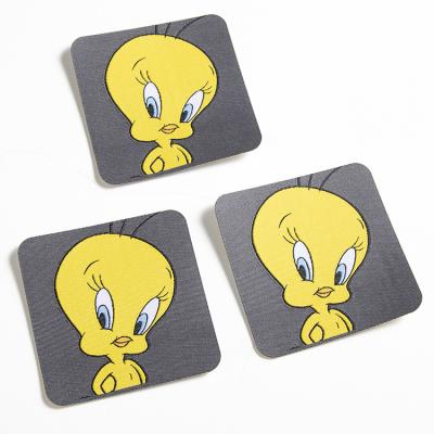 China Sustainable Wholesale Yellow Duck Cartoon Cute Woven Patch Customized Label For Clothing for sale