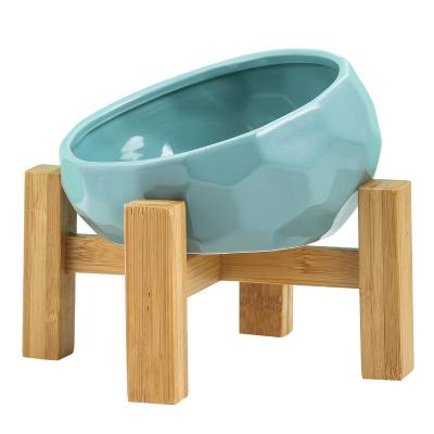 China Sustainable Wholesale  Pet Supplies  Elevated Ceramic Pet Bowls Oblique Mouth Dog Bowl with Wooden Holder for sale