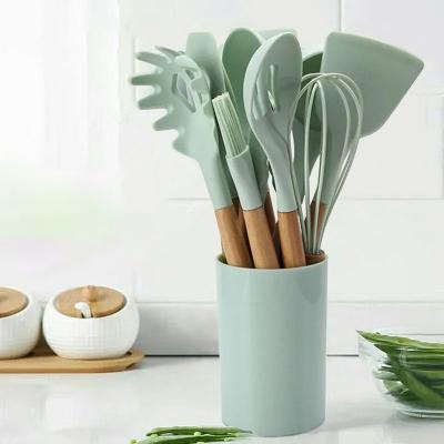 China Viable 12 Pieces In 1 Set Silicone Kitchen Accessories Cooking Tools Kitchen Tableware Cocina Silicone Cookware With Wooden Handles for sale