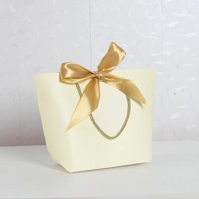 China Handbag Handmade Custom Paper Shopping Bags With Logo Print Paper Handle Luxury Gift Bags With Logo for sale