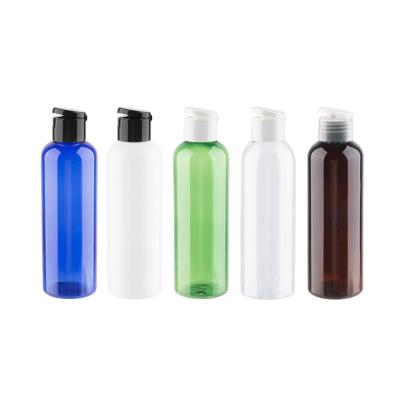 China 200ml Amber Refillable Cosmetic Bottle Empty Clear Clear Plastic PET Shampoo Container With Flip Top Cap Capacity for sale