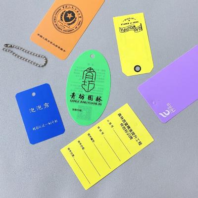 China Sustainable Luxury PVC Price Swing Tags Custom Printed Brand Recycled White Plastic Hang Tag Logo Labels For Garment And Product for sale