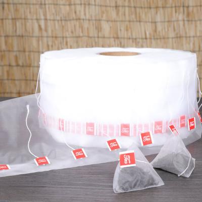 China Low MOQ Hotels Heat Seal Disposable Empty Coffee Tea Bag Nylon Filter Roll Material Friendly With Customized Label for sale