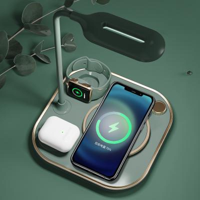 China Smart Watch 4 in1 Desktop Table LED Lamp 20W Wireless Fast Charging Wireless Charger for iPhone 13/12/11 S7-2 Watch Wireless Charger for sale