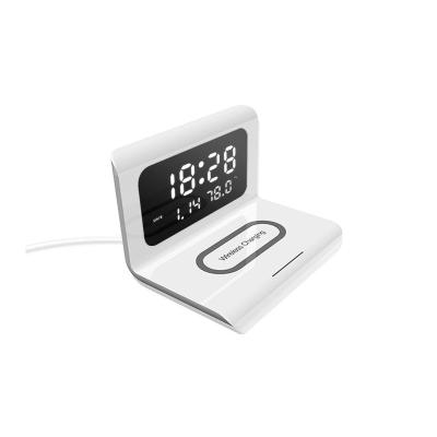 China With 3-1 multi-function mobile phone radio clock time alarm clock wireless charger charging stand creative fast wireless charging for sale